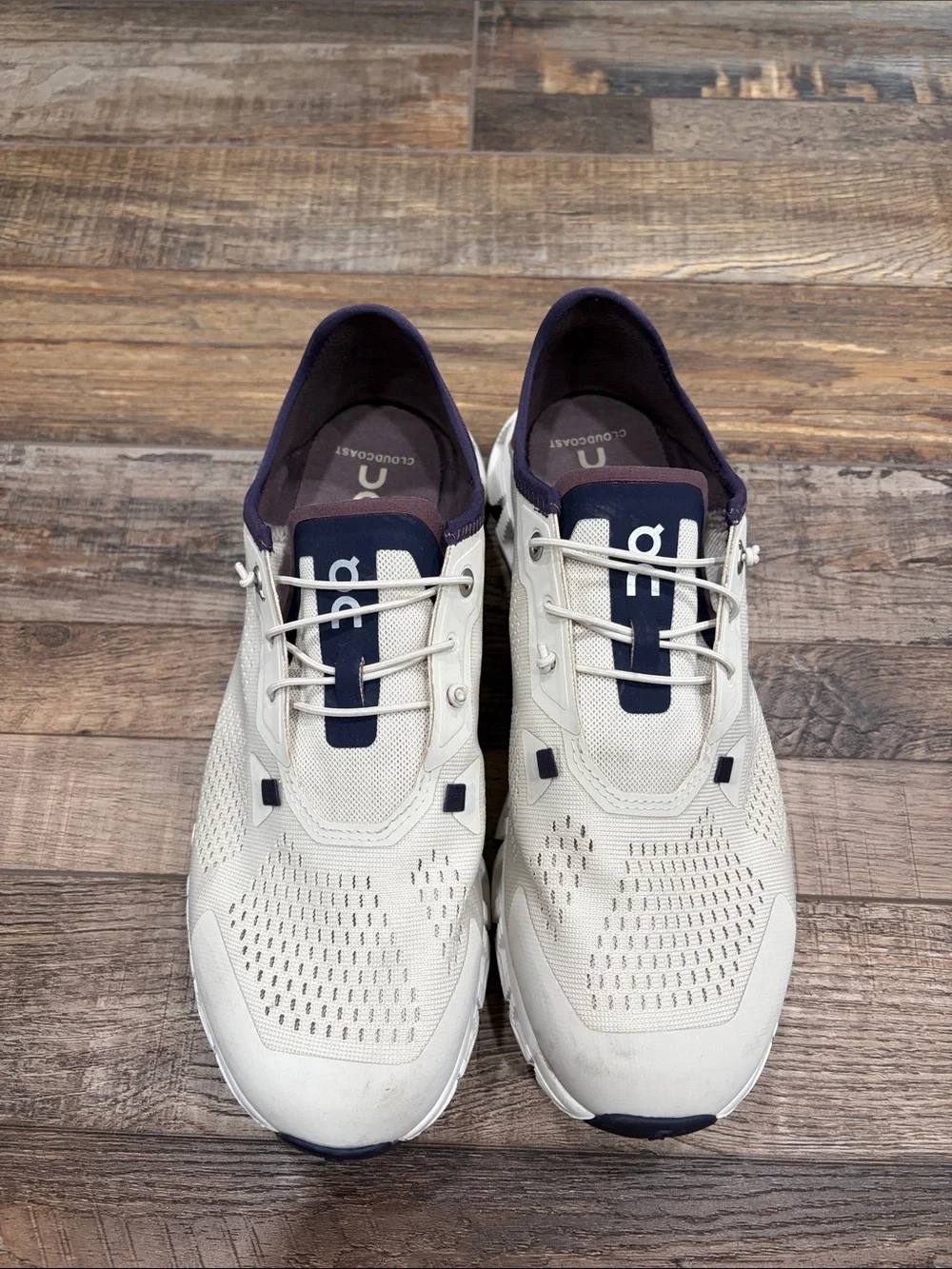 On Running Women's Sneakers in Cream and Navy Accent